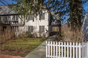 83 Kensington Road Bronxville, NY 10708 - Photo 1 of 1 a view of a wooden house with a yard