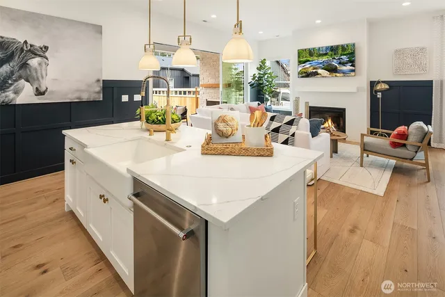 a view of living room with furniture and fireplace