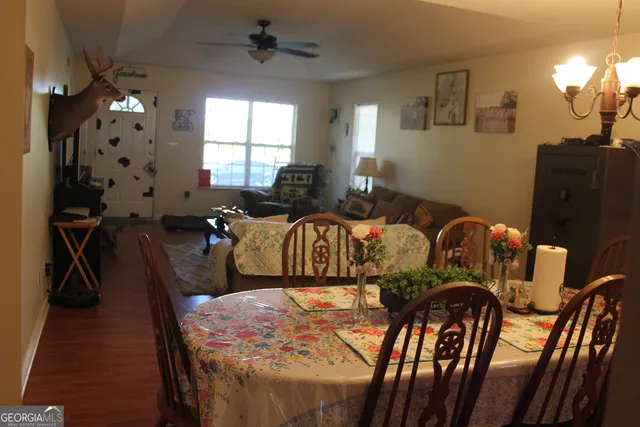 a view of a dining room with furniture