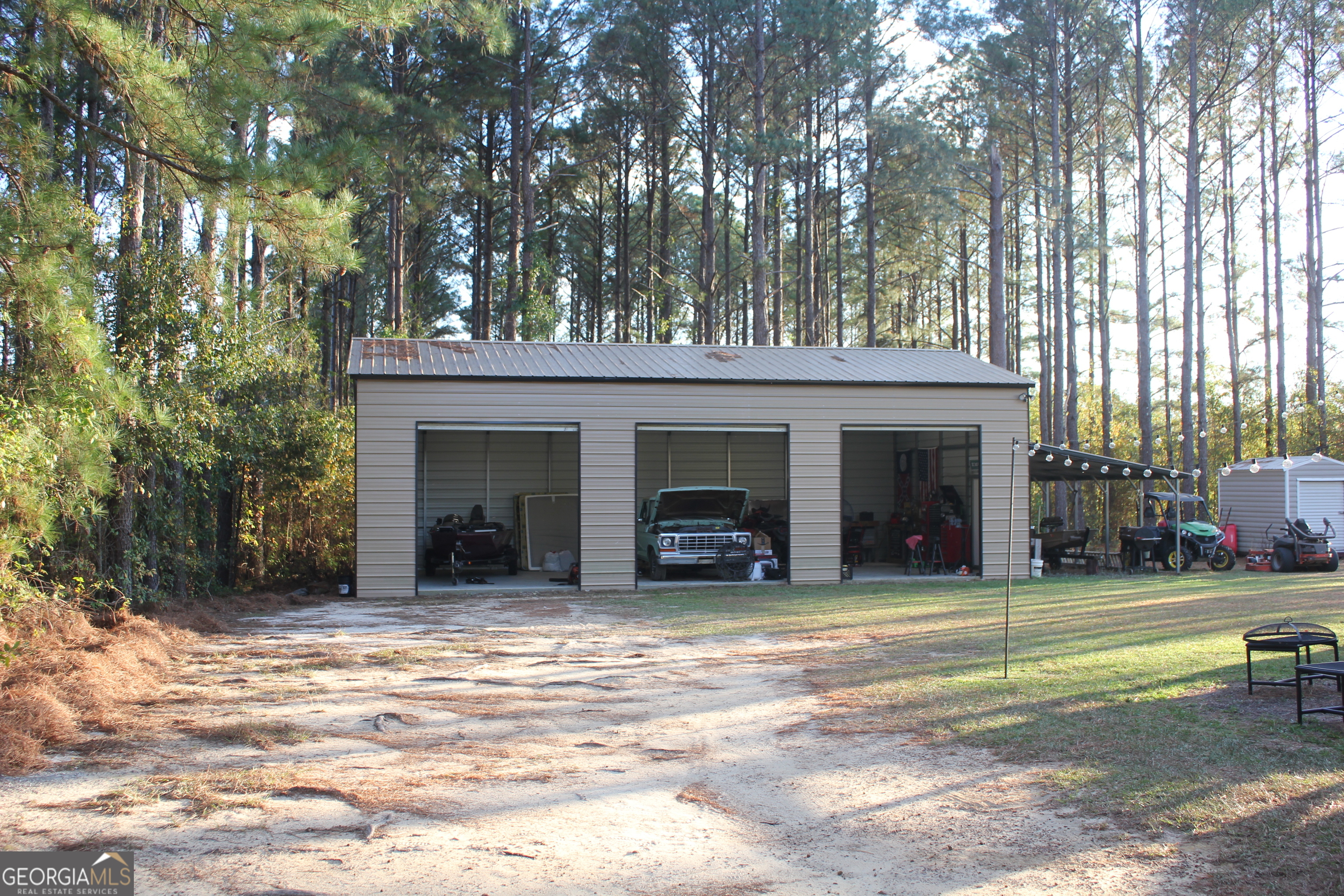 2850 Isaac Akins Road Statesboro, GA 30458 - Photo 29 of 29 a view of a house with outdoor space and porch