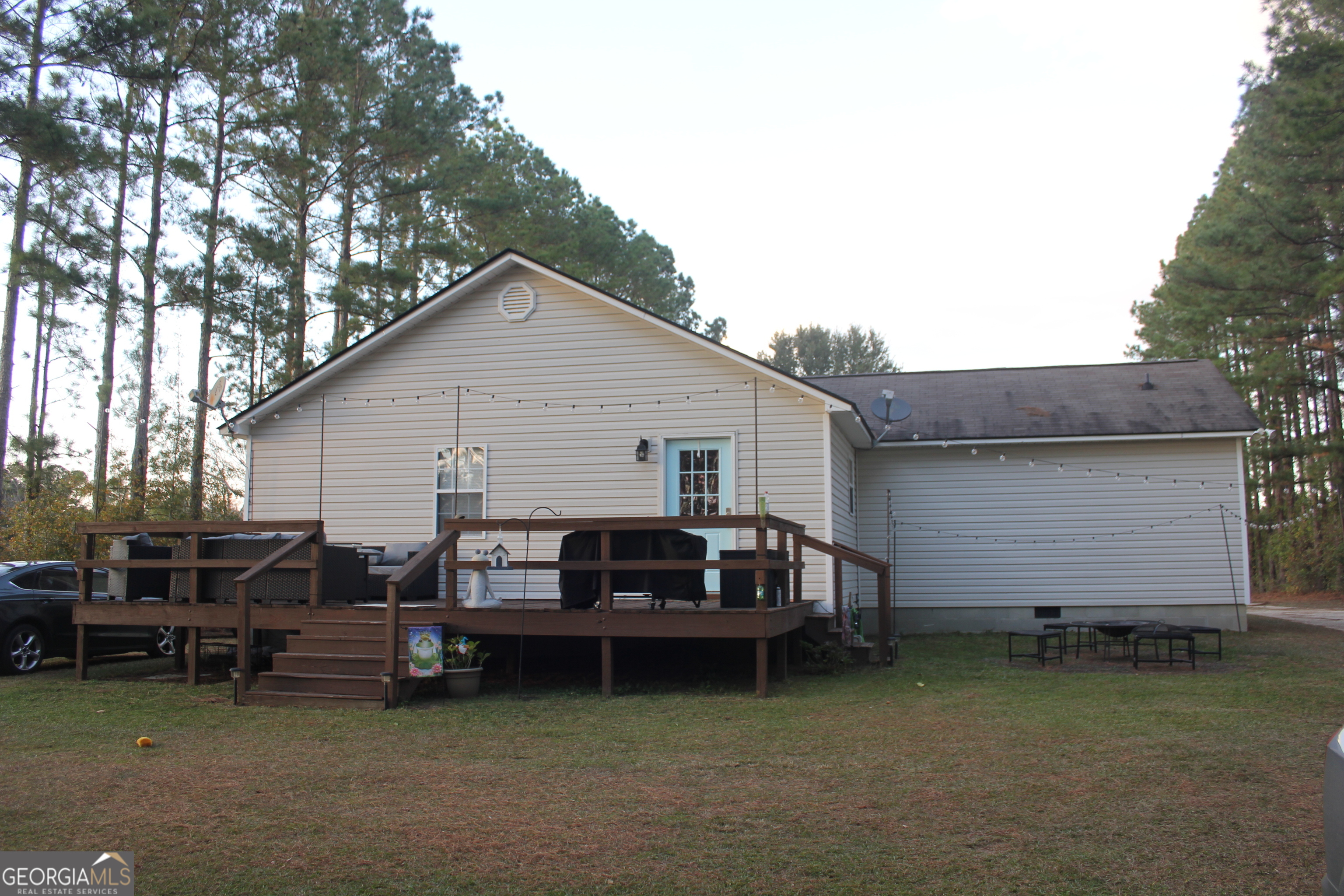 2850 Isaac Akins Road Statesboro, GA 30458 - Photo 6 of 29 a view of a house with a yard and sitting area
