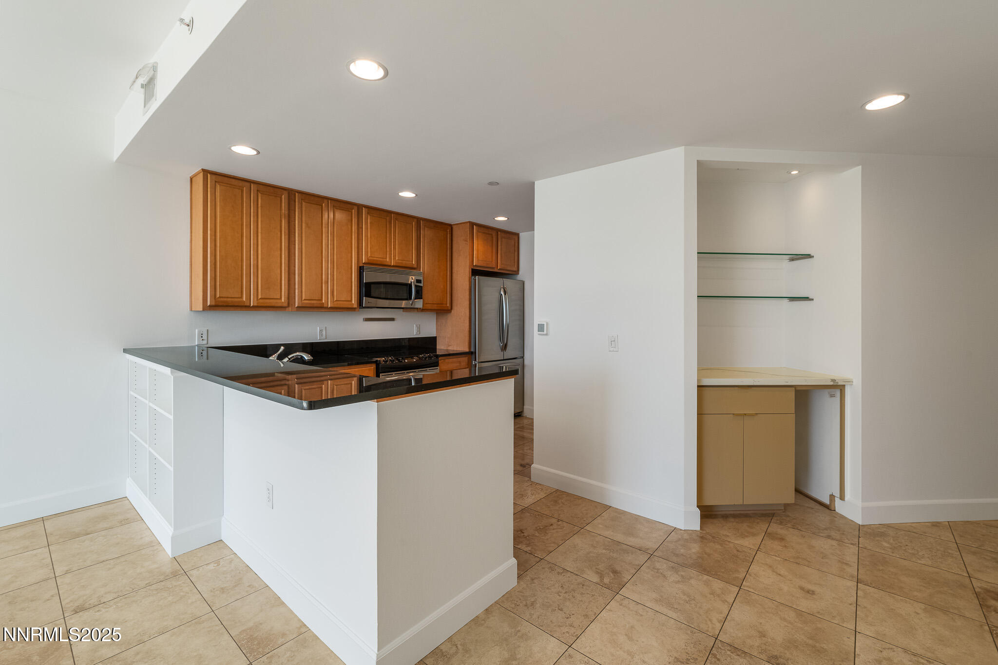 50 North Sierra Street, Unit STE 909 Reno, NV 89501 - Photo 10 of 34 a view of kitchen cabinets and appliances