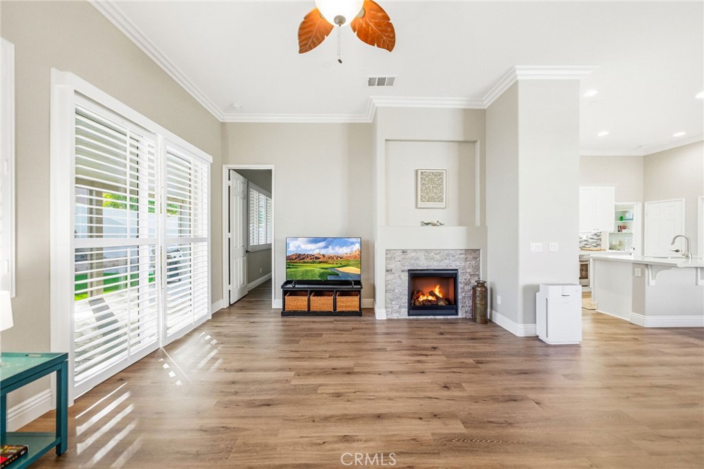 26535 Rim Creek Path, Unit PATHWAY Menifee, CA 92584 - Photo 20 of 50 a living room with furniture and a fireplace