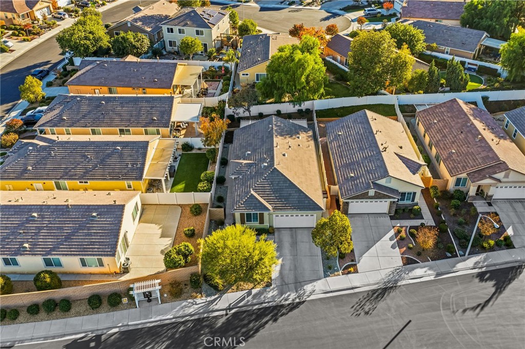 26535 Rim Creek Path, Unit PATHWAY Menifee, CA 92584 - Photo 42 of 50 an aerial view of houses with street