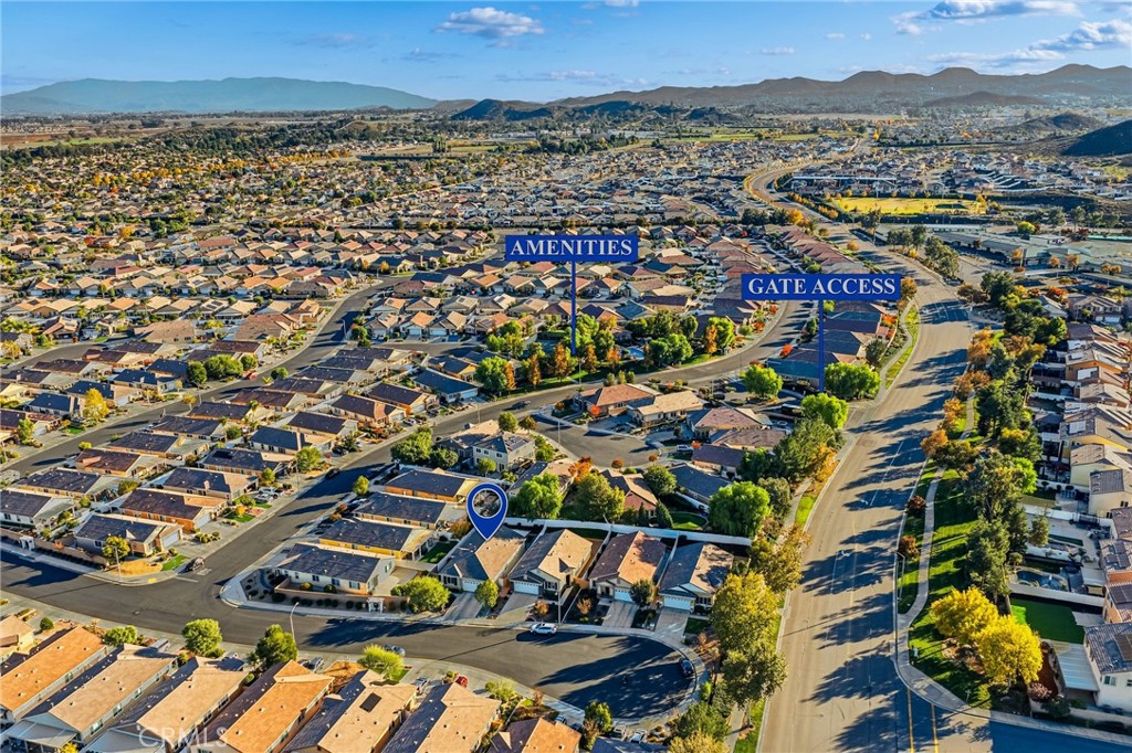 26535 Rim Creek Path, Unit PATHWAY Menifee, CA 92584 - Photo 45 of 50 an aerial view of multiple house