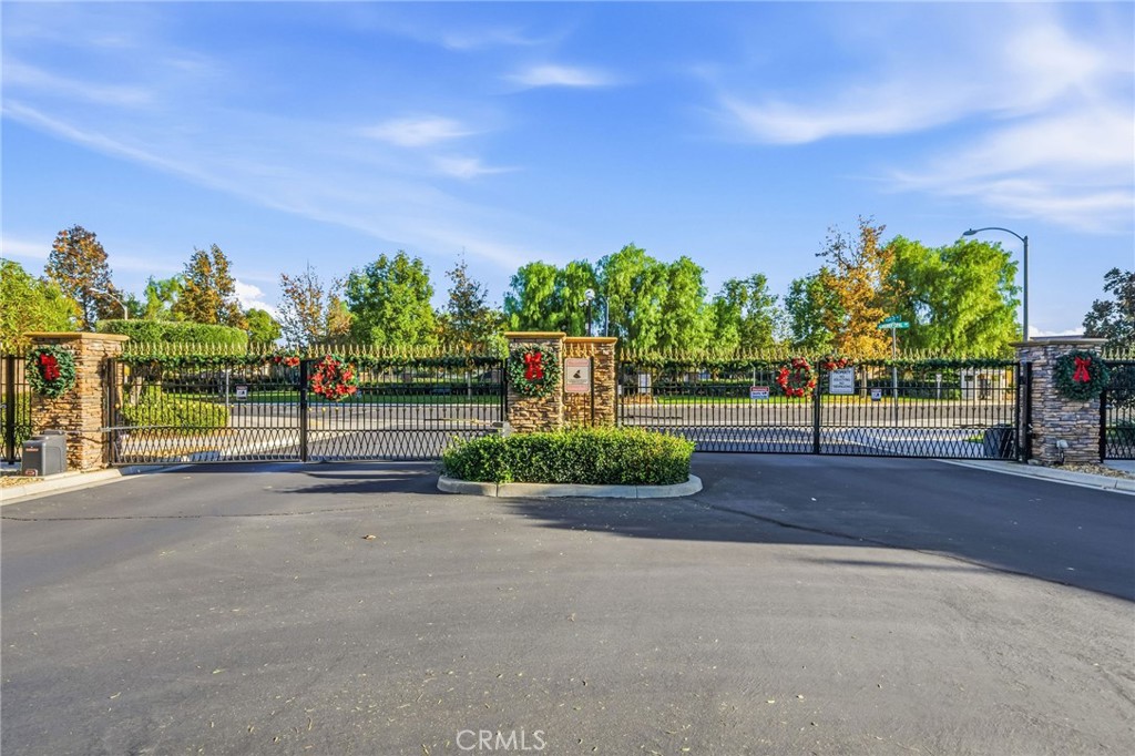26535 Rim Creek Path, Unit PATHWAY Menifee, CA 92584 - Photo 50 of 50 a view of a street with a houses