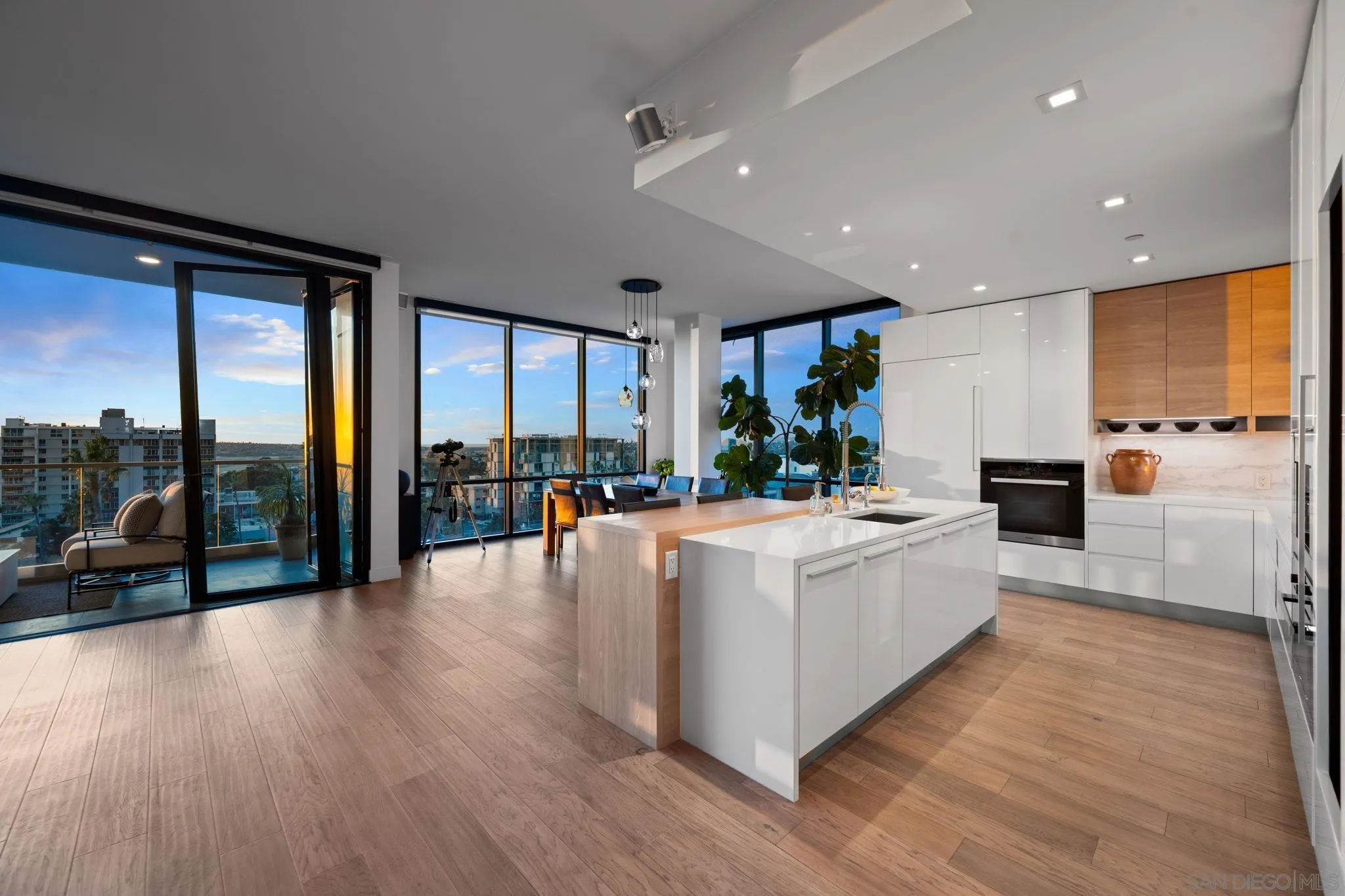 2604 Fifth Avenue, Unit 804 San Diego, CA 92103 - Photo 15 of 72 a living room with stainless steel appliances furniture large windows and a view of living room