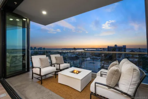 a terrace of a house with outdoor seating