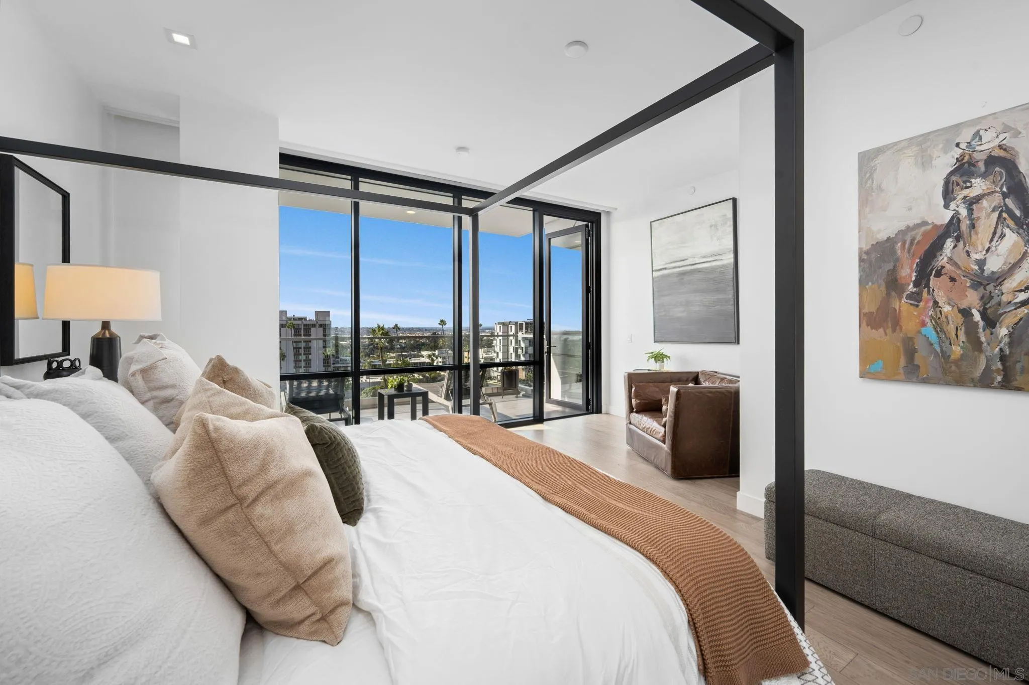 2604 Fifth Avenue, Unit 804 San Diego, CA 92103 - Photo 33 of 72 a bedroom with a large bed and a large window