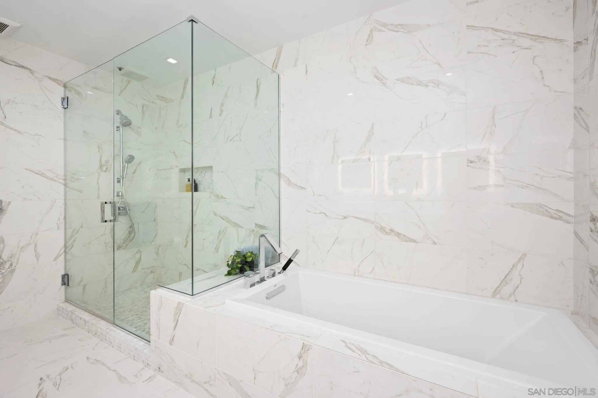 2604 Fifth Avenue, Unit 804 San Diego, CA 92103 - Photo 41 of 72 a bathroom with a bathtub and a shower