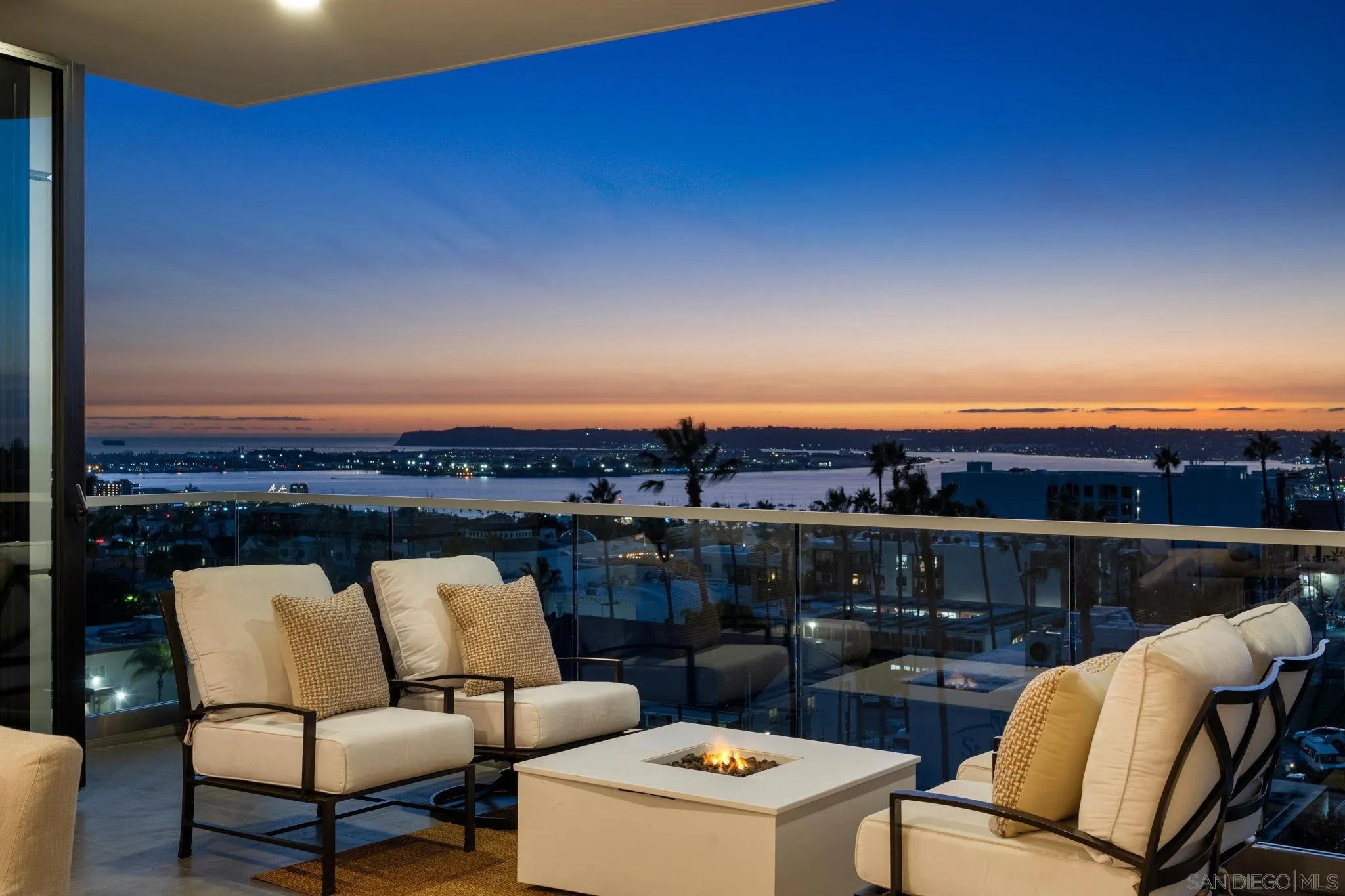 2604 Fifth Avenue, Unit 804 San Diego, CA 92103 - Photo 60 of 72 a view of a balcony with furniture and a fireplace