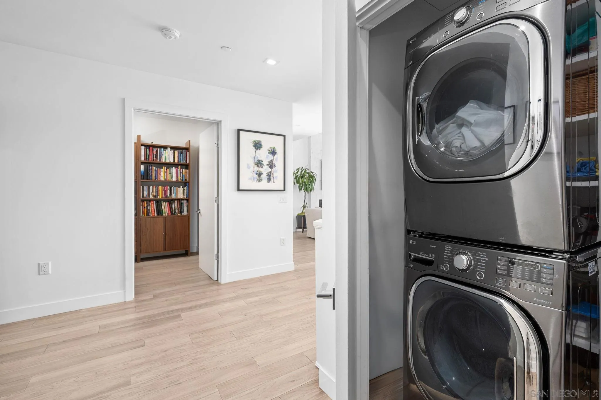 2604 Fifth Avenue, Unit 804 San Diego, CA 92103 - Photo 63 of 72 a view of a hallway with washer and dryer
