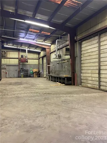 a view of a room with wooden walls