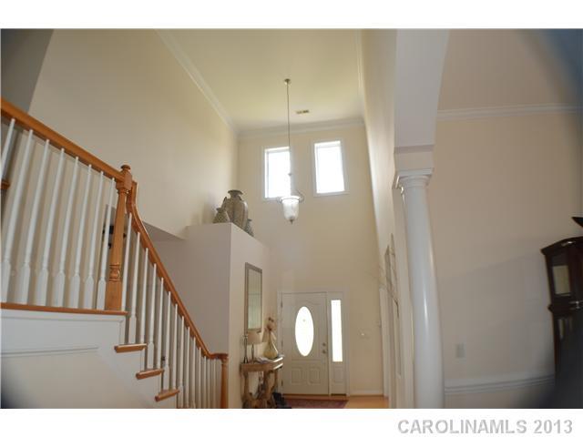 1705 Copperplate Road Charlotte, NC 28262 - Photo 6 of 14 a view of a hallway with windows
