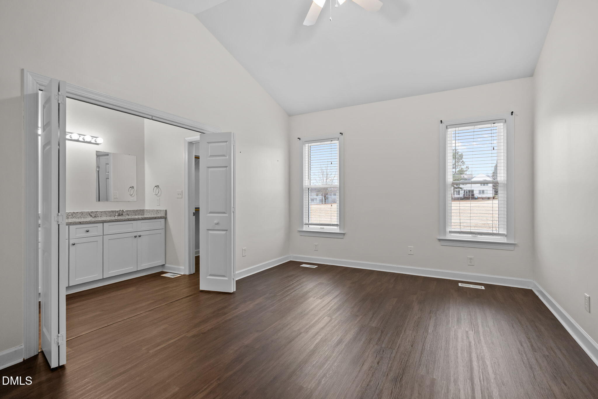 1953 Castle Pines Drive Raleigh, NC 27604 - Photo 18 of 47 an empty room with wooden floor and windows