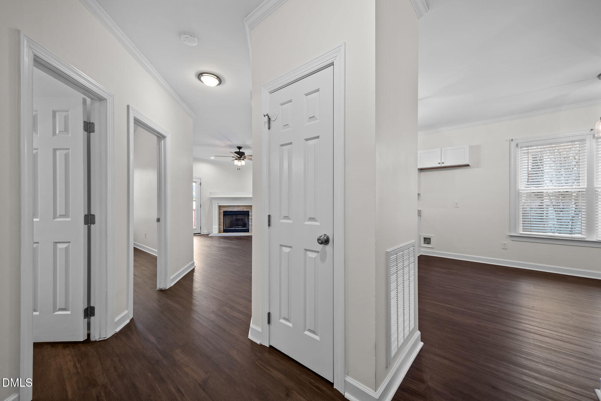 1953 Castle Pines Drive Raleigh, NC 27604 - Photo 25 of 47 an empty room with wooden floor and a window