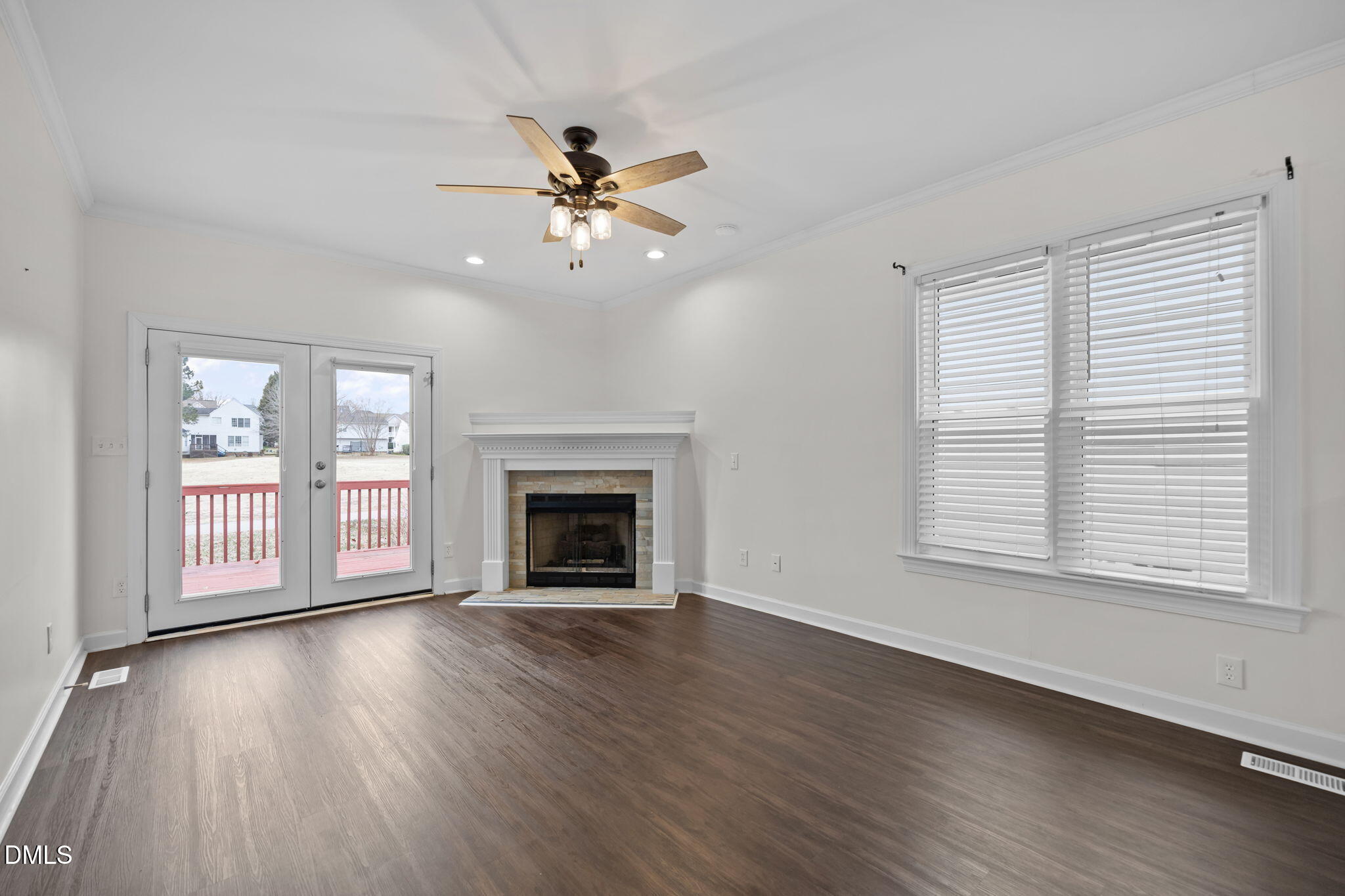 1953 Castle Pines Drive Raleigh, NC 27604 - Photo 26 of 47 a view of an empty room with wooden floor and a window