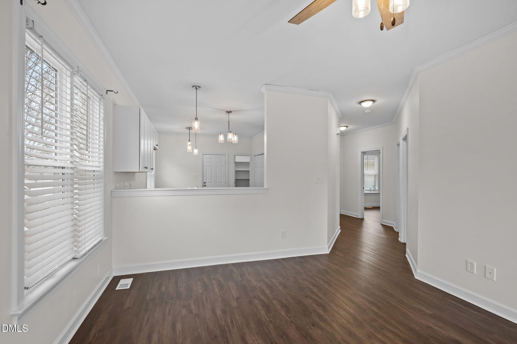 1953 Castle Pines Drive Raleigh, NC 27604 - Photo 29 of 47 wooden floor in an empty room with a window