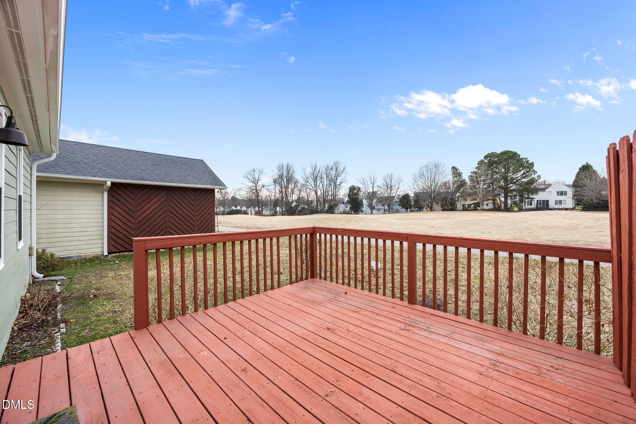 1953 Castle Pines Drive Raleigh, NC 27604 - Photo 31 of 47 a balcony with wooden floor and fence