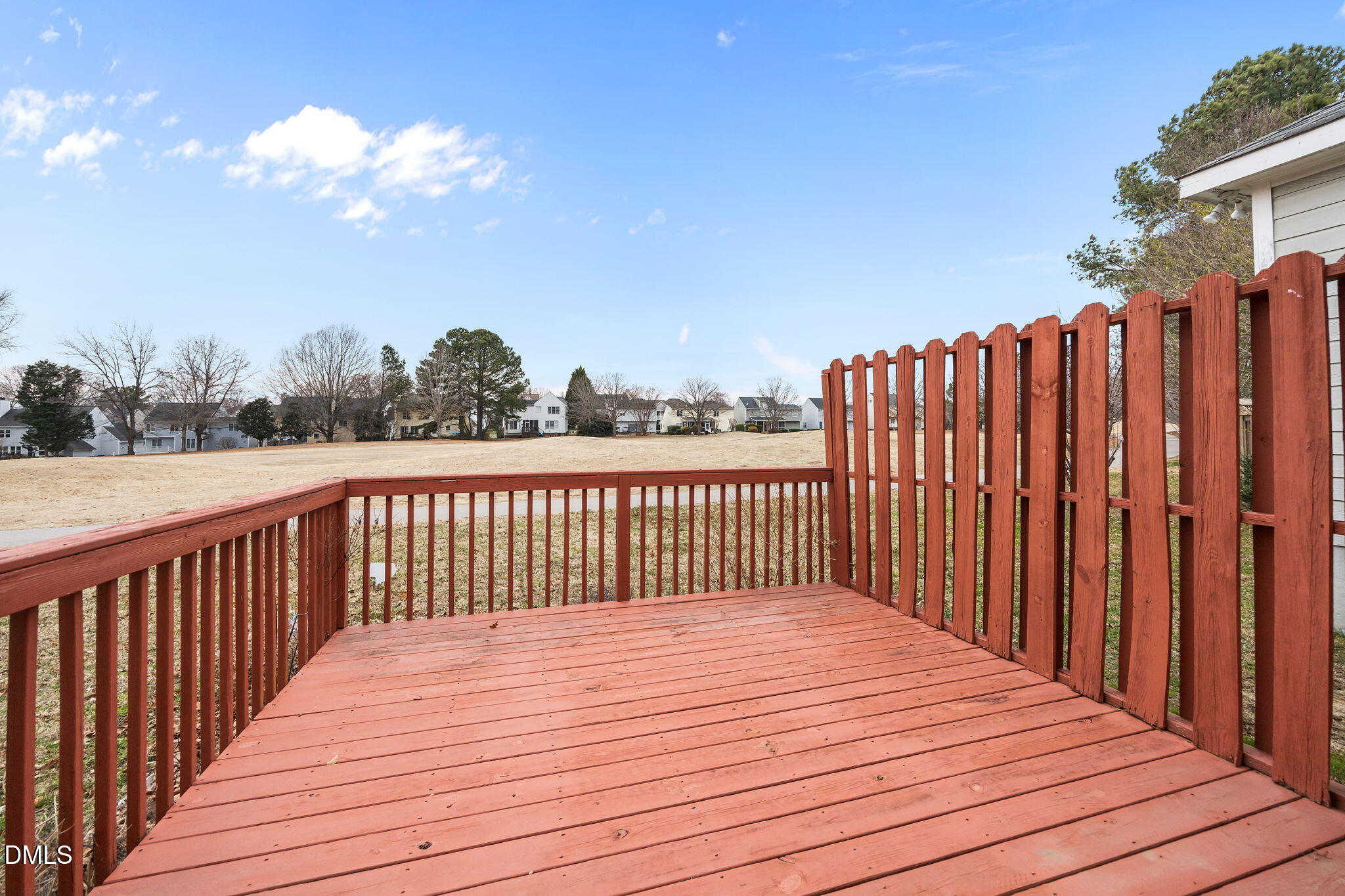 1953 Castle Pines Drive Raleigh, NC 27604 - Photo 32 of 47 a balcony with wooden floor and fence