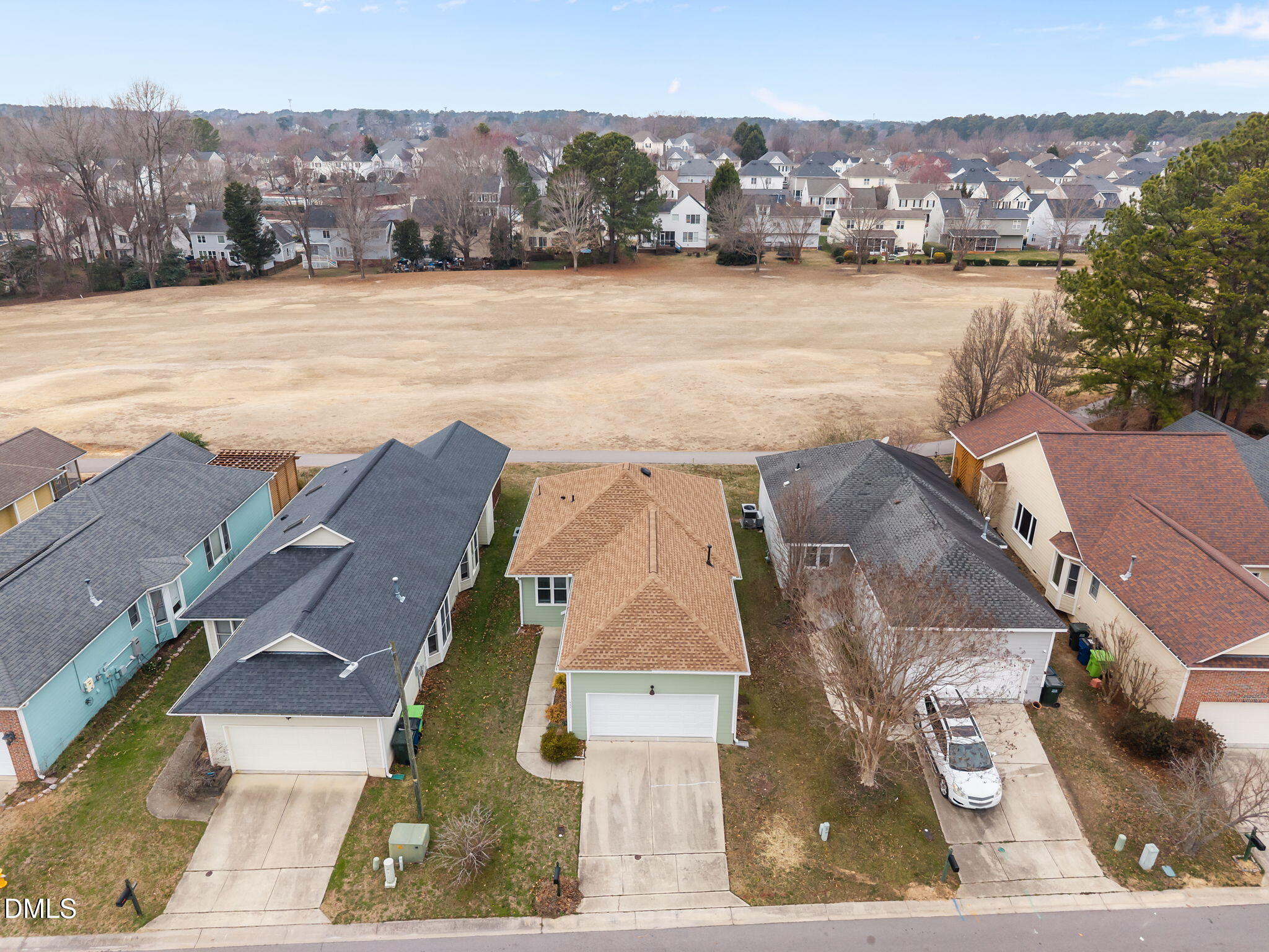 1953 Castle Pines Drive Raleigh, NC 27604 - Photo 41 of 47 an aerial view of residential houses with outdoor space and lake view