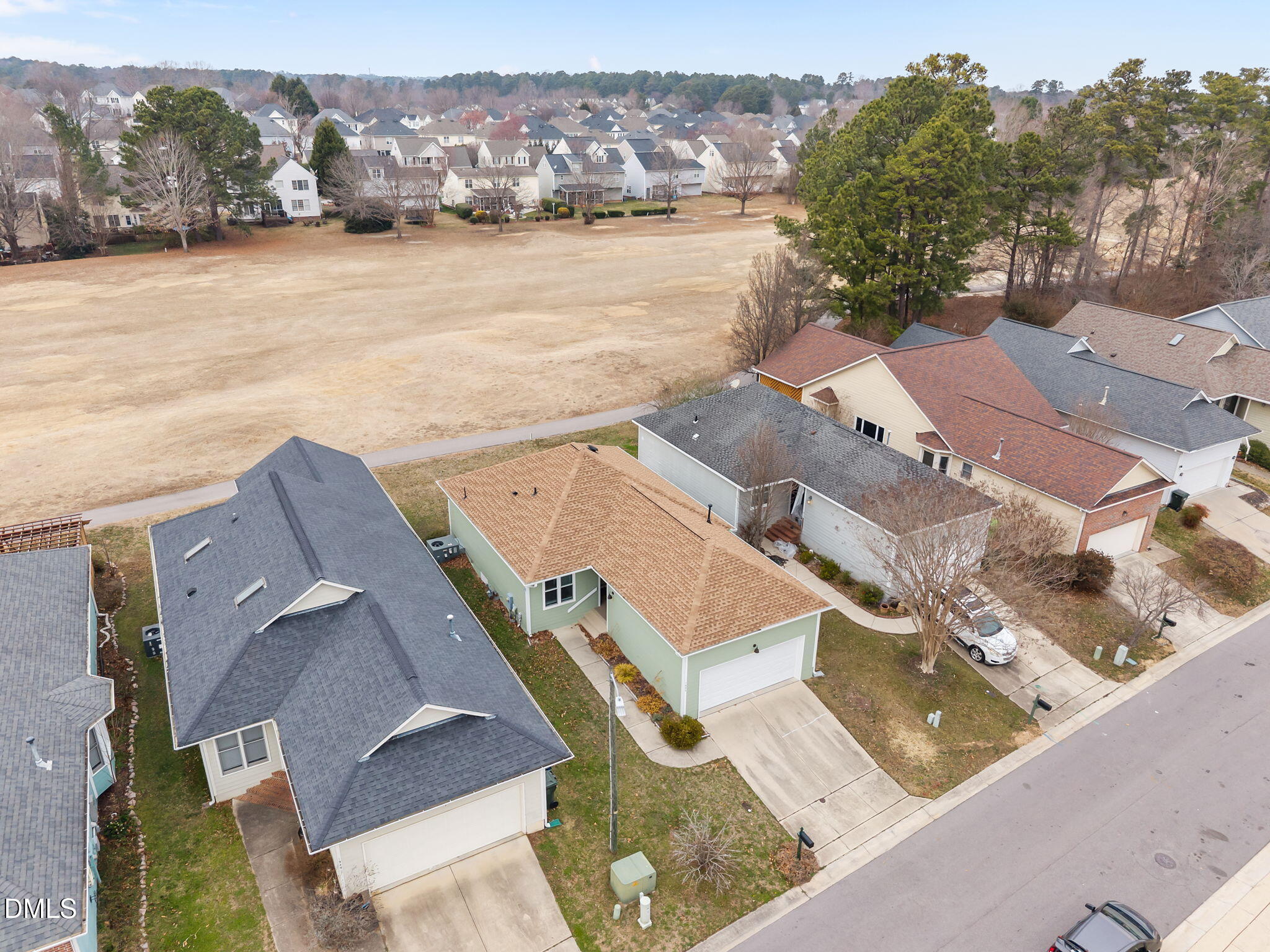 1953 Castle Pines Drive Raleigh, NC 27604 - Photo 42 of 47 an aerial view of residential houses with outdoor space