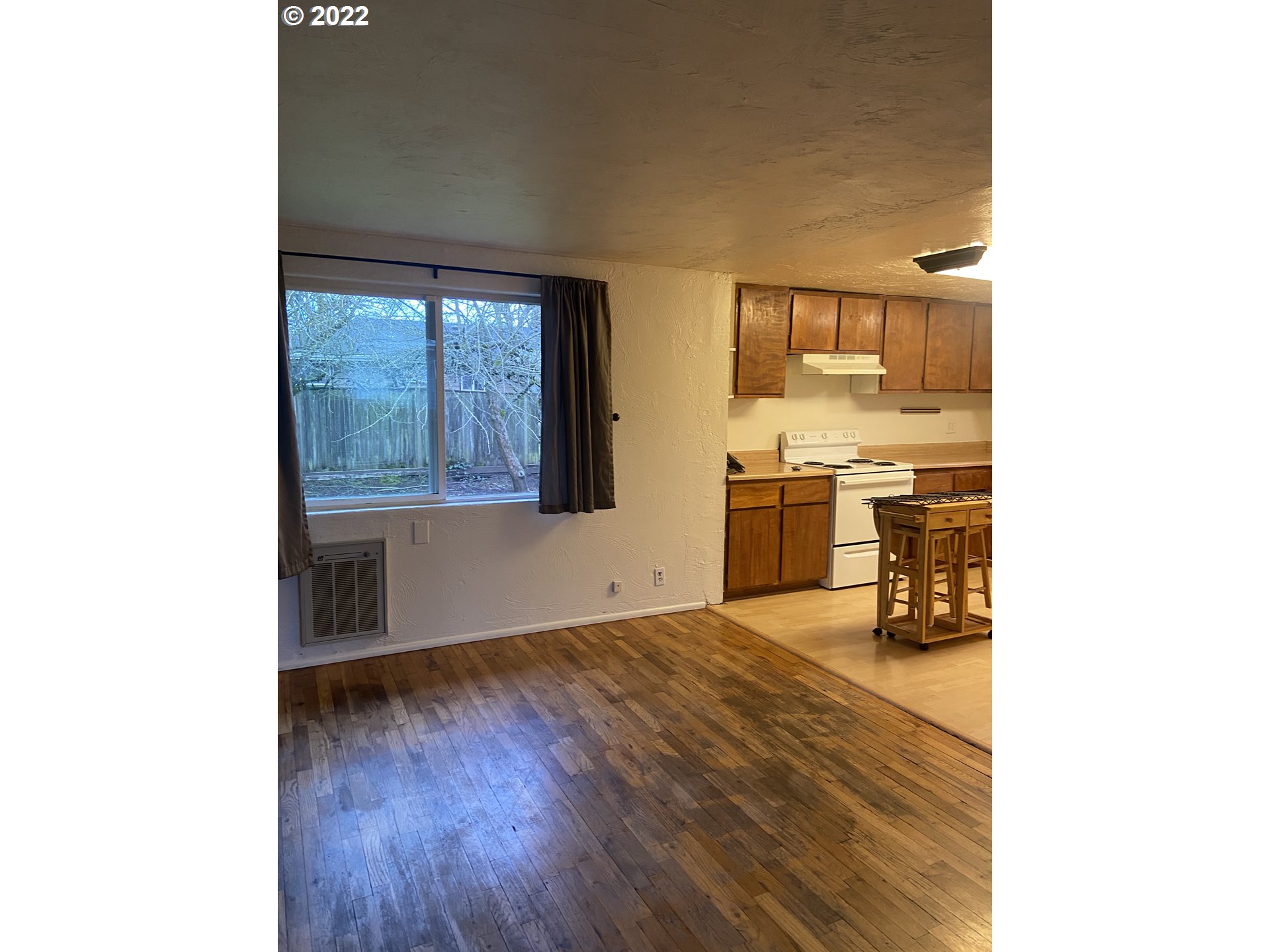 902 25th Place Springfield, OR 97477 - Photo 2 of 15 a view of a kitchen with a sink and a window