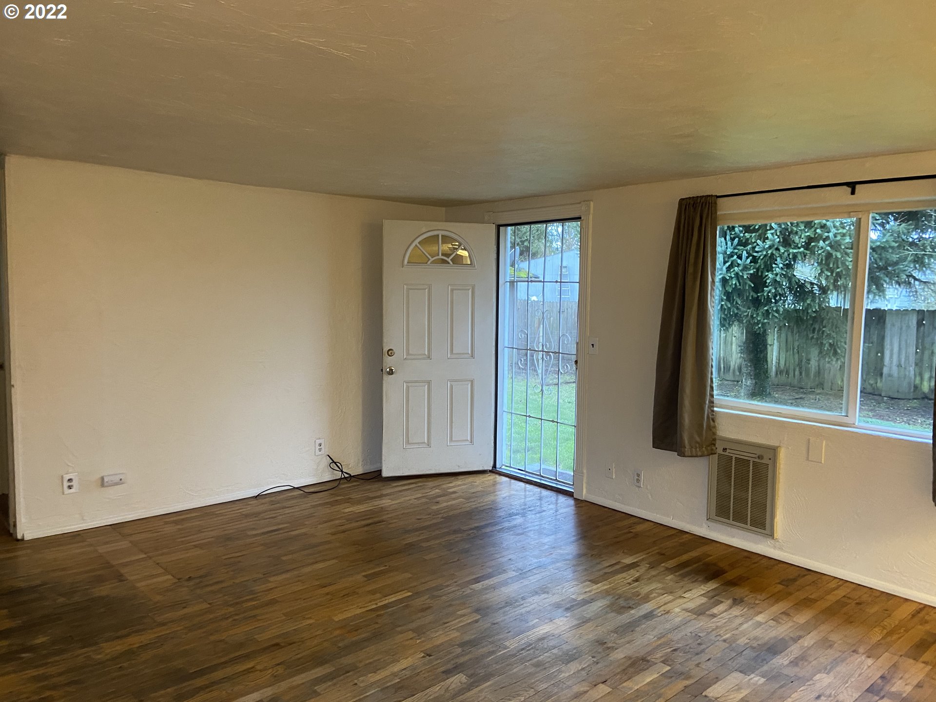 902 25th Place Springfield, OR 97477 - Photo 6 of 15 a view of wooden floor and brick walls