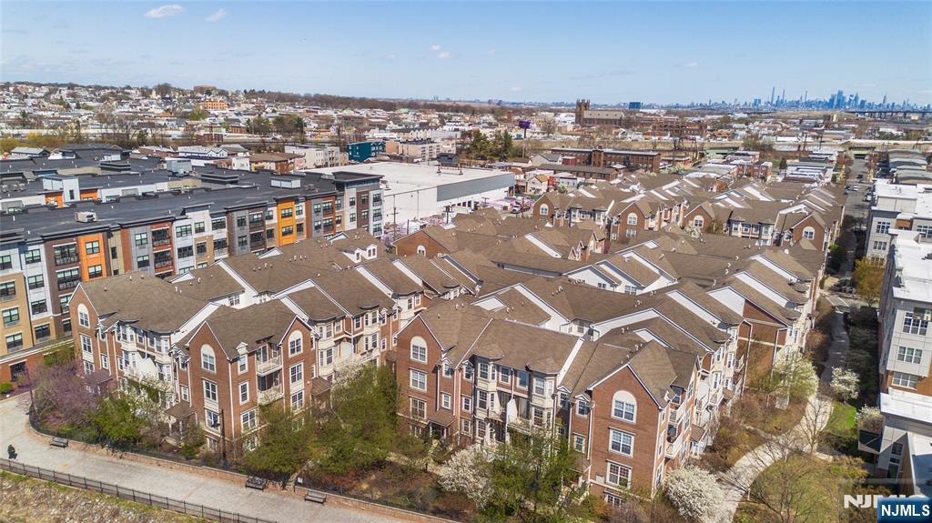 201 Dey Street, Unit 124 Harrison, NJ 07029 - Photo 1 of 26 an aerial view of multiple house