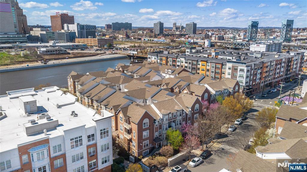 201 Dey Street, Unit 124 Harrison, NJ 07029 - Photo 2 of 26 a picture of city view with lake view