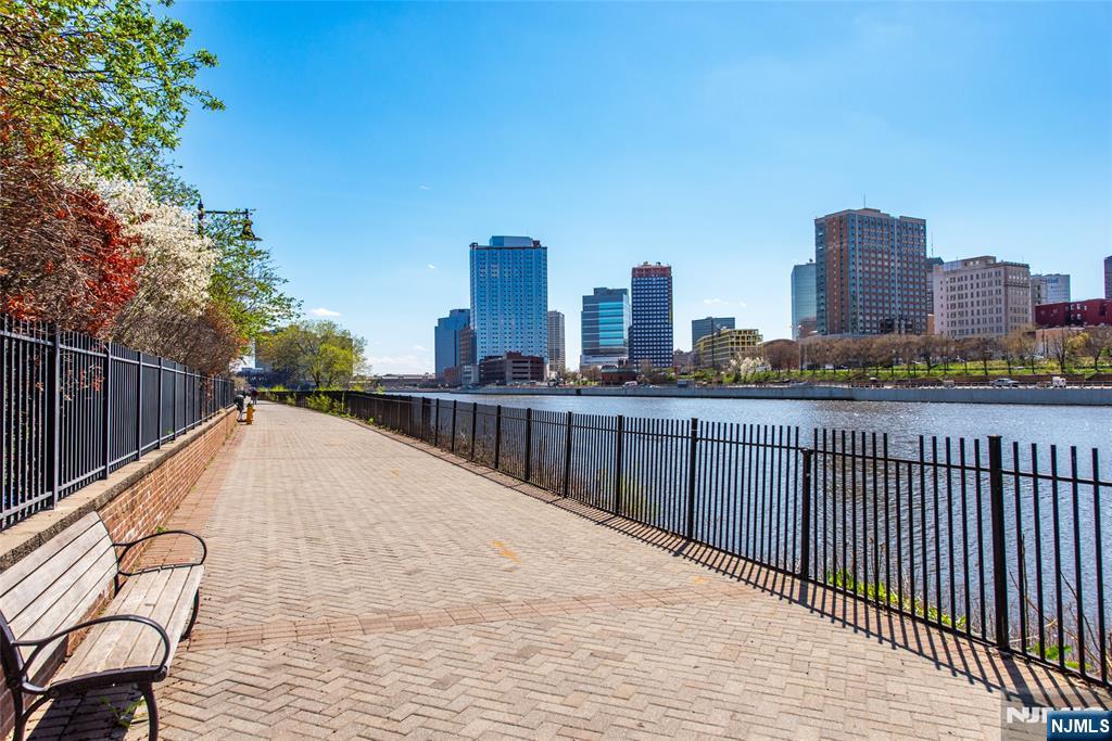 201 Dey Street, Unit 124 Harrison, NJ 07029 - Photo 25 of 26 a view of roof deck with city view