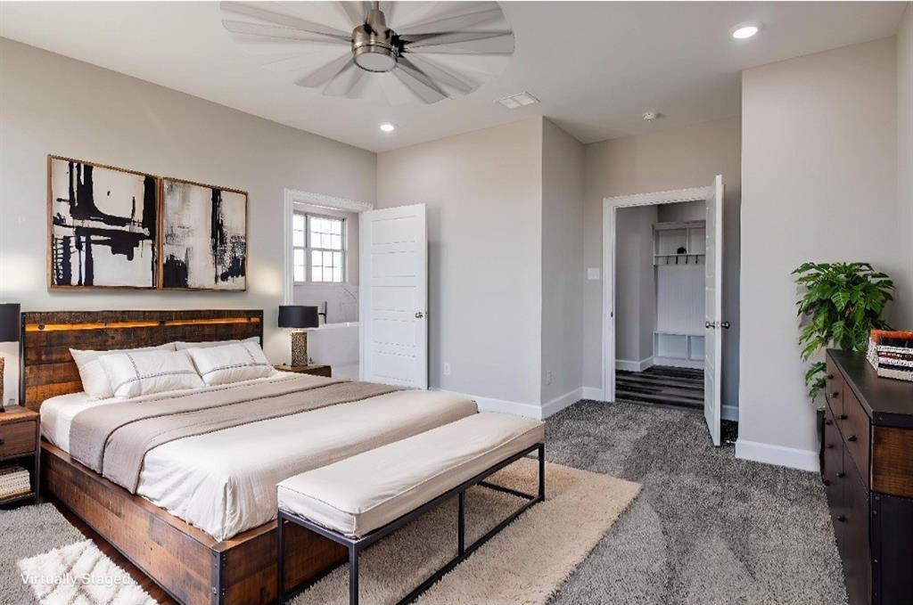 6180 Old Sherman Road Whitesboro, TX 76273 - Photo 13 of 30 a bedroom with a bed and a chandelier