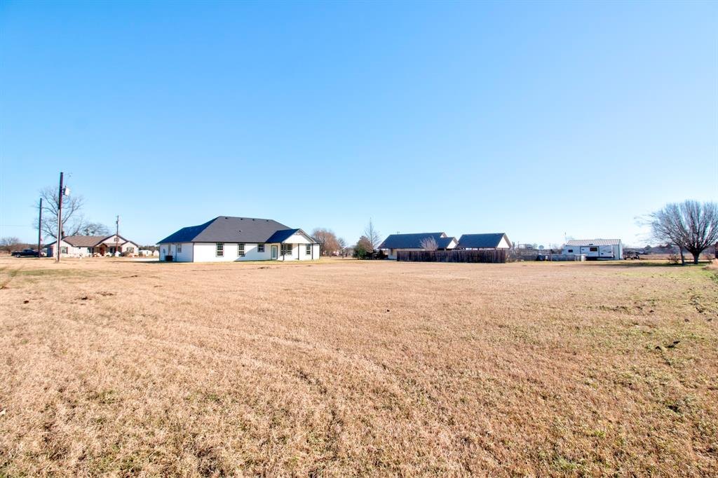 6180 Old Sherman Road Whitesboro, TX 76273 - Photo 28 of 30 a view of swimming pool and an outdoor space
