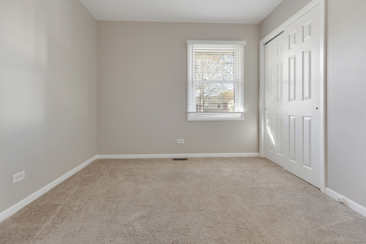 635 Love Street Elk Grove Village, IL 60007 - Photo 15 of 20 an empty room with windows