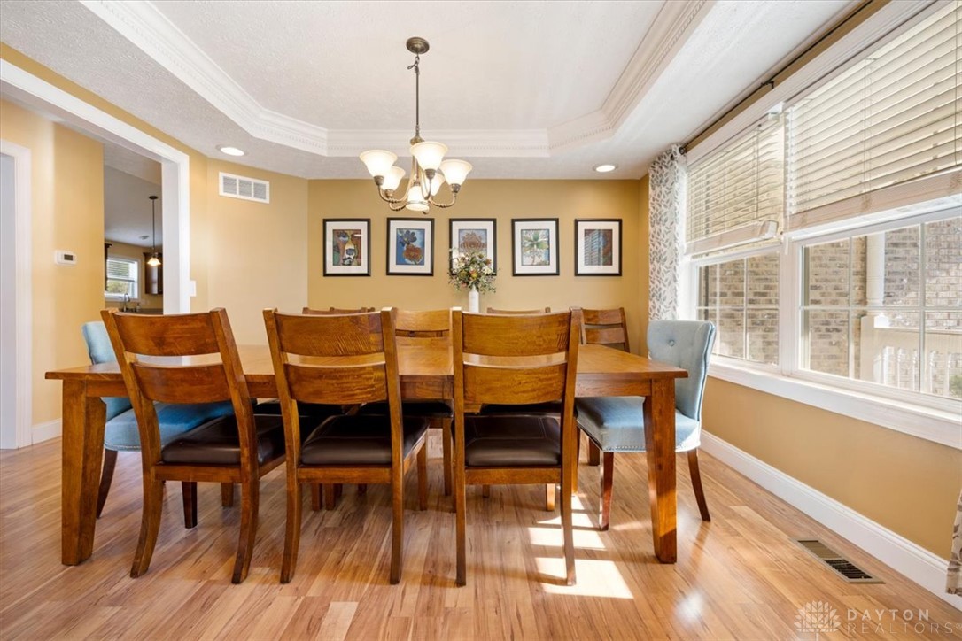 841 Willow Road Springfield, OH 45502 - Photo 5 of 64 This dining room offers warm wood flooring and abundant natural light.