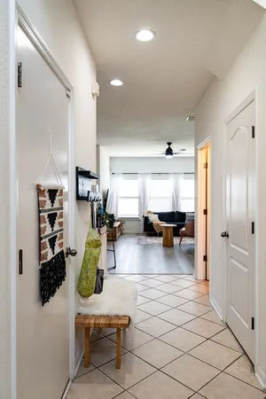 a living room with furniture and a table