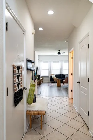 a living room with furniture and a table