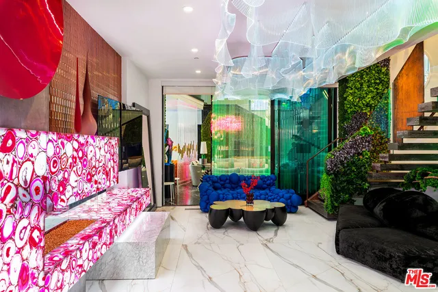 a outdoor dining space with furniture and rug