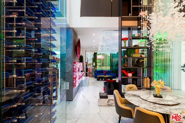 a dining room filled with lots of potted plants