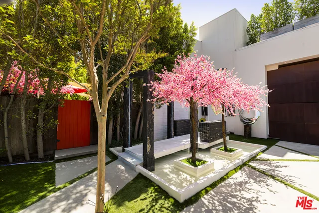 a front view of a house with yard