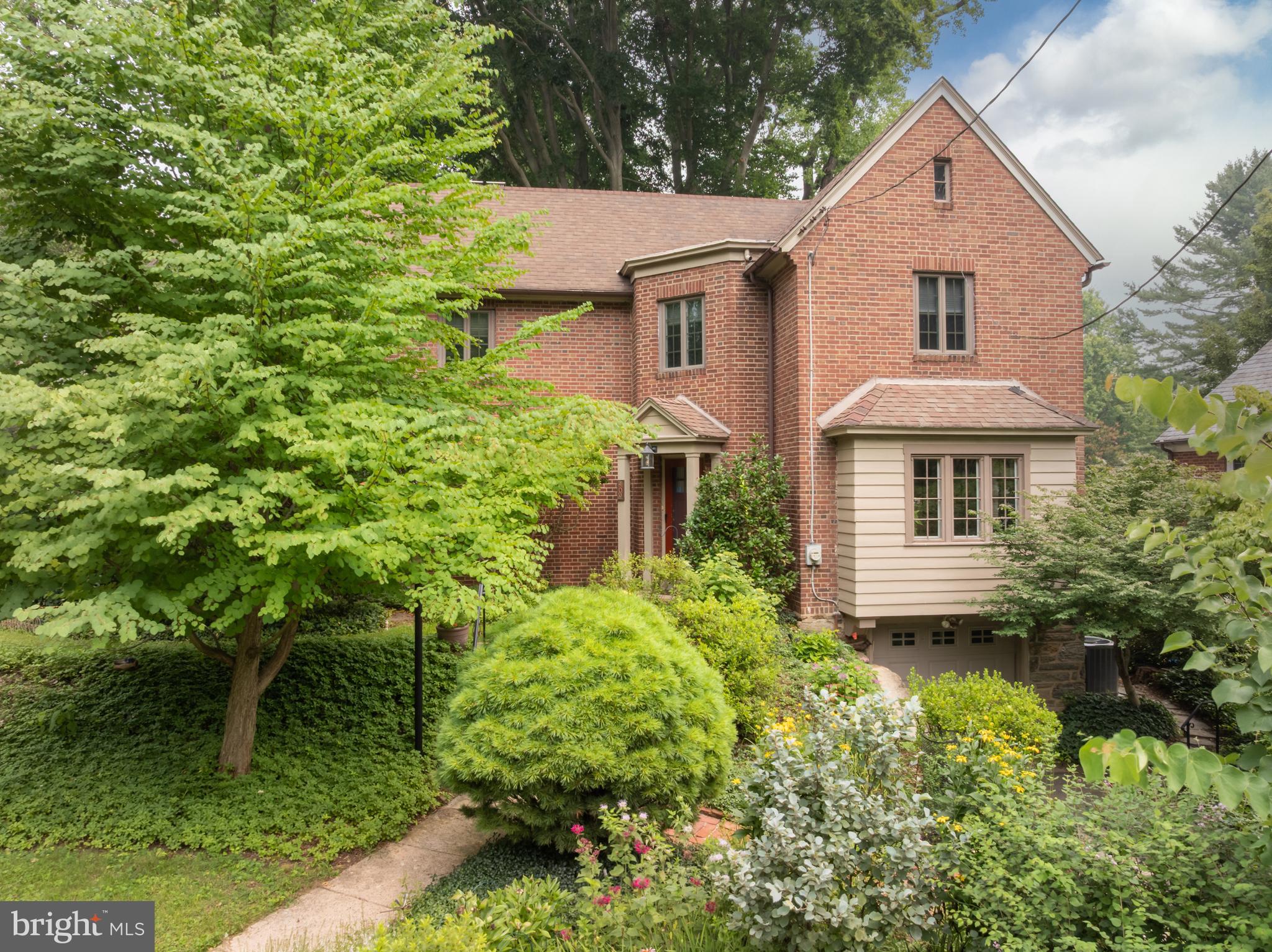 409 East Waverly Road Wyncote, PA 19095 - Photo 1 of 36 a front view of a house with a yard and porch