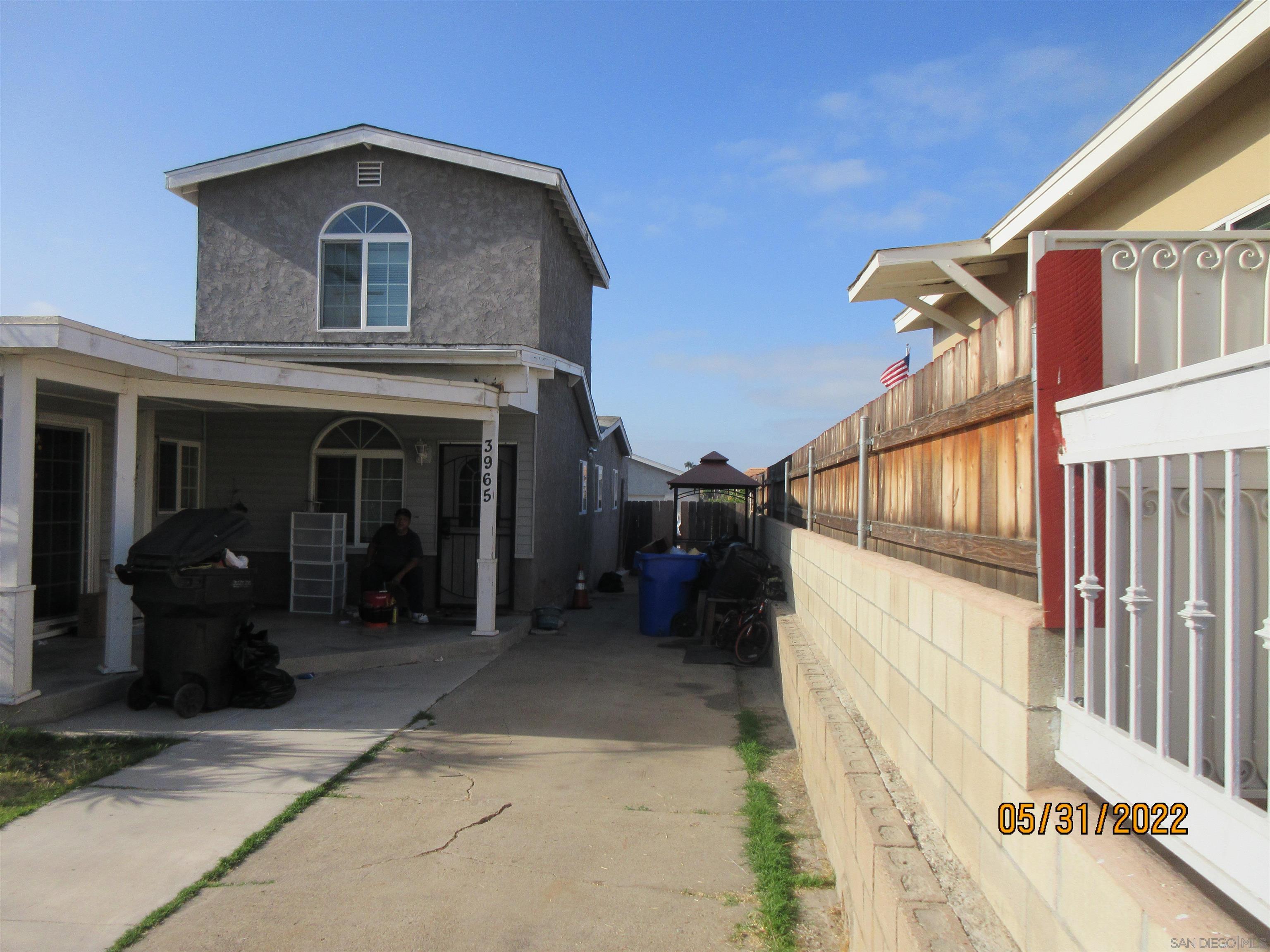 3965 Newton Avenue San Diego, CA 92113 - Photo 1 of 37 a view of a house with a patio