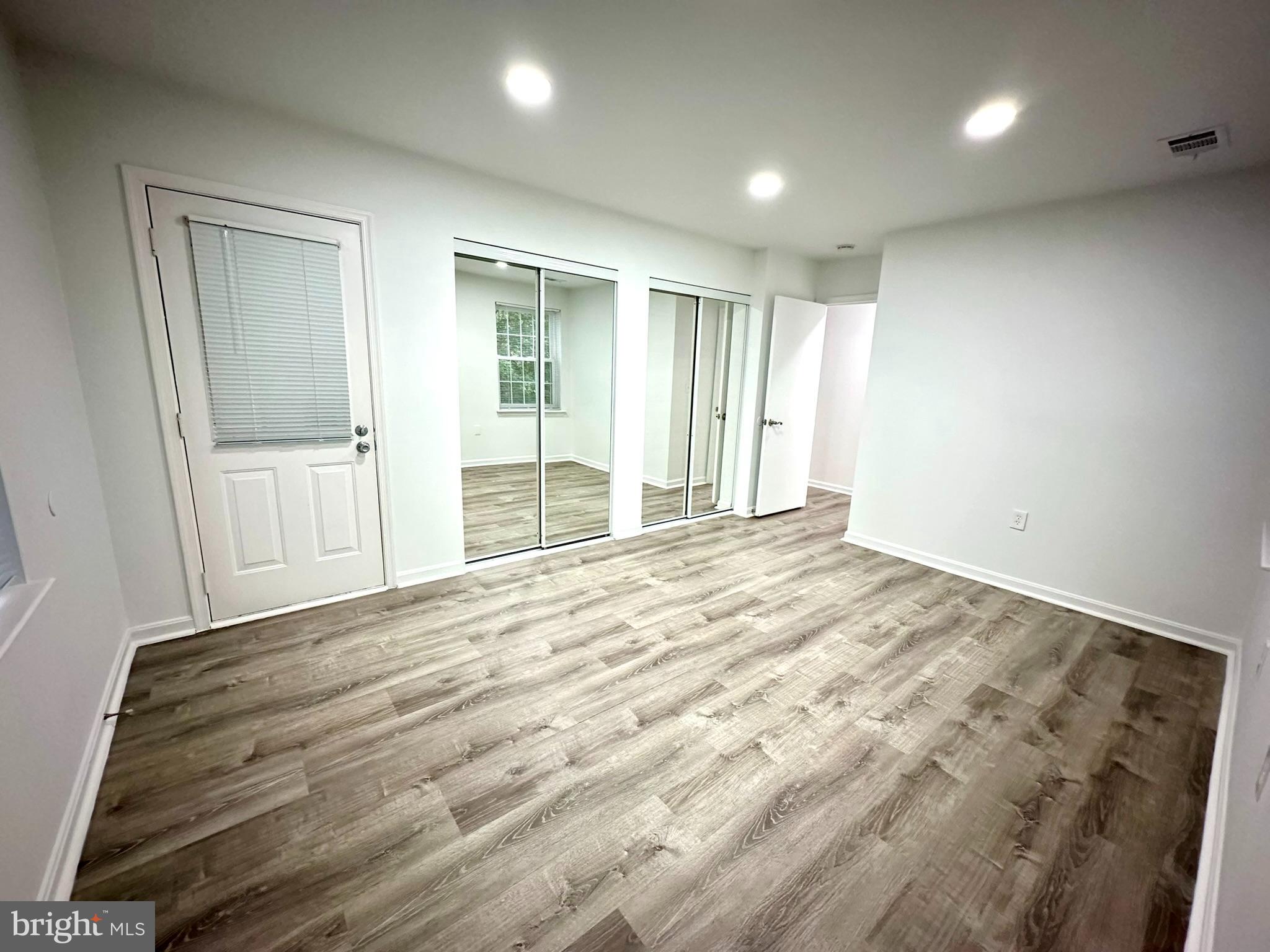 18334 Streamside Drive, Unit 202 Gaithersburg, MD 20879 - Photo 28 of 61 a view of an empty room