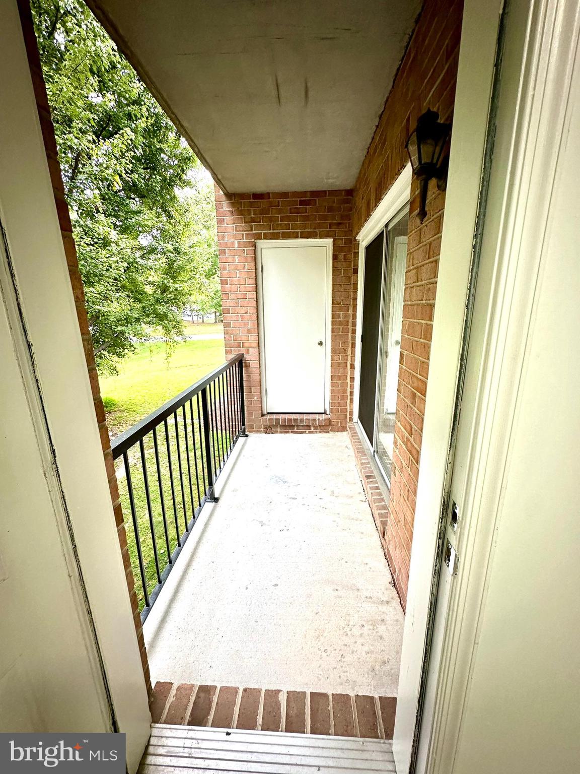 18334 Streamside Drive, Unit 202 Gaithersburg, MD 20879 - Photo 29 of 61 a view of a balcony