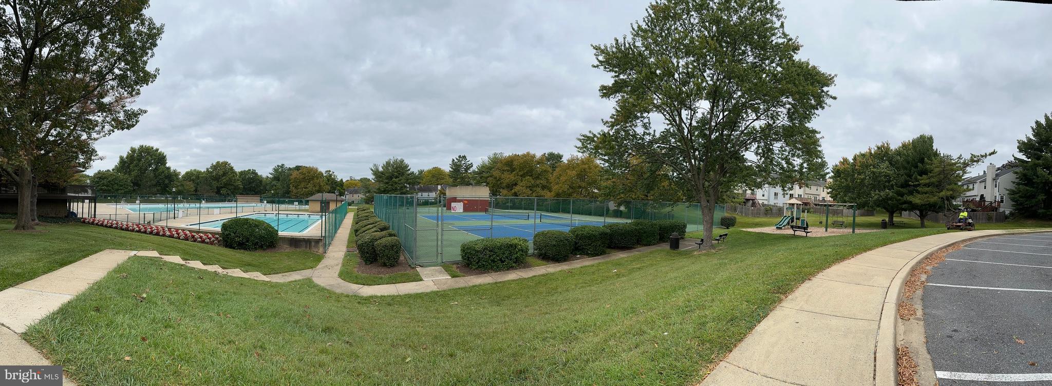 18334 Streamside Drive, Unit 202 Gaithersburg, MD 20879 - Photo 58 of 61 a view of a park with large trees