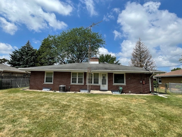 802 Westminster Road Joliet, IL 60435 - Photo 15 of 15 a front view of house with yard and green space