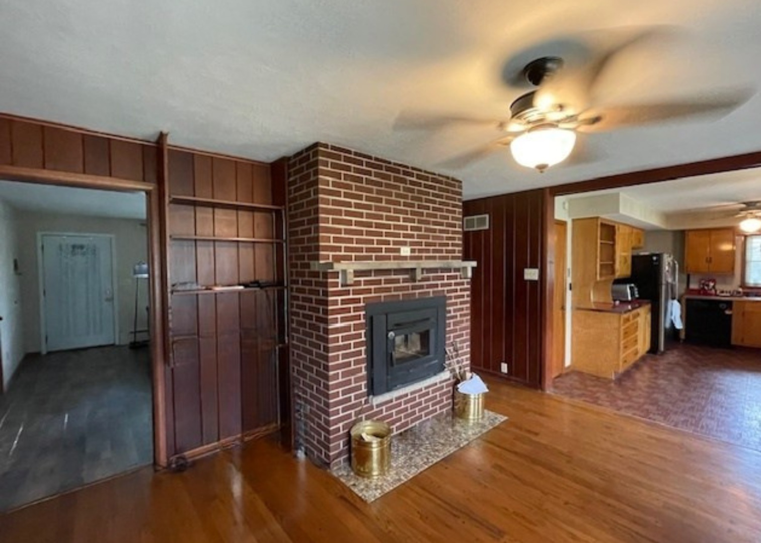 802 Westminster Road Joliet, IL 60435 - Photo 5 of 15 a living room with furniture and a fireplace