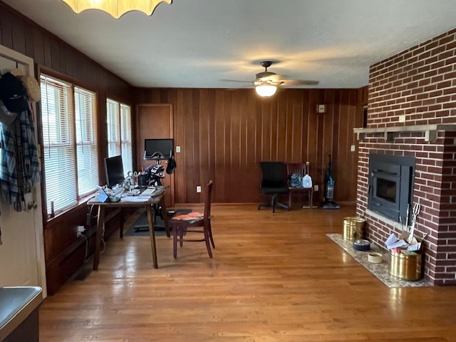 802 Westminster Road Joliet, IL 60435 - Photo 8 of 15 a living room with furniture a fireplace and a flat screen tv