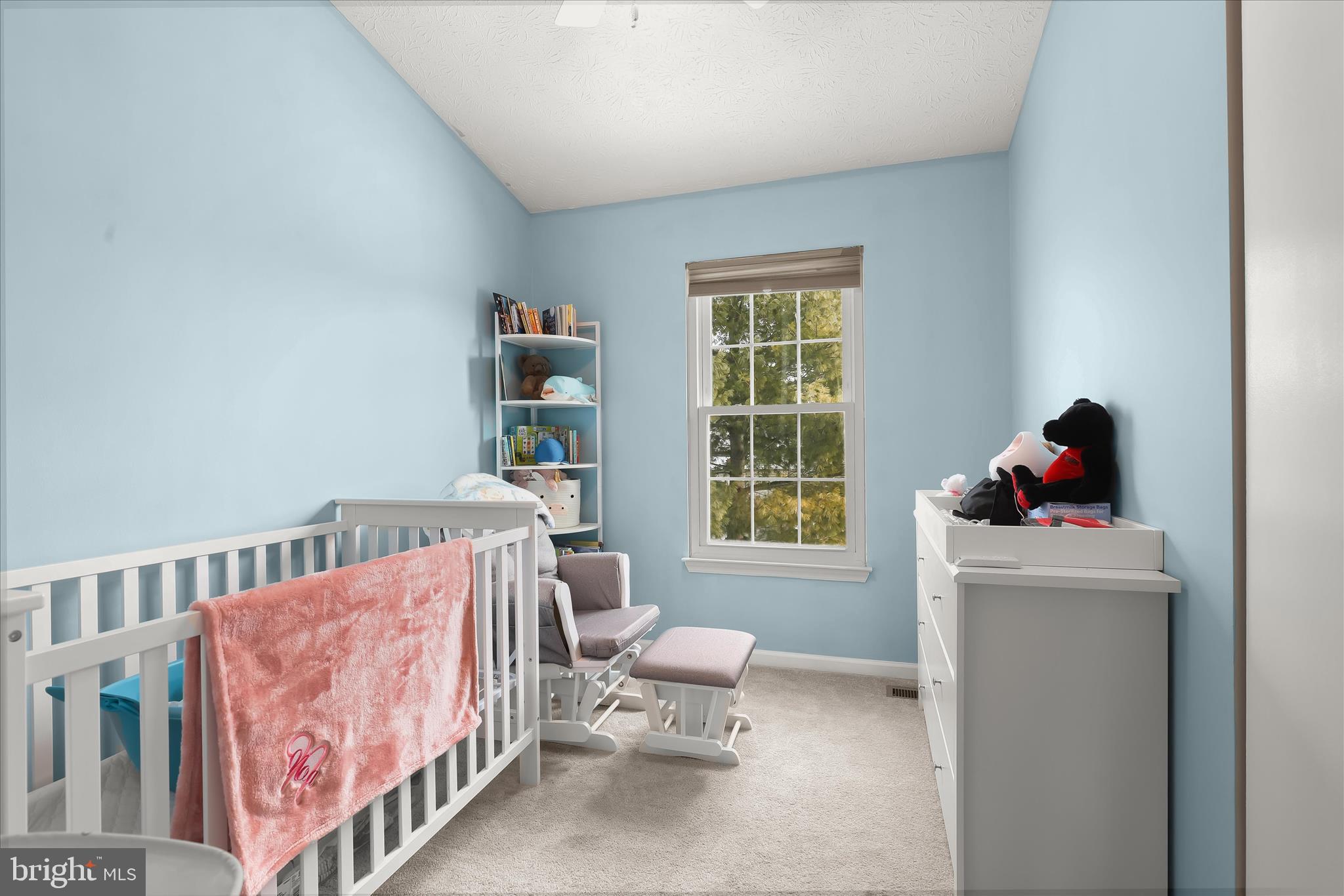 2019 Amber Way Baltimore, MD 21244 - Photo 14 of 27 a bedroom with a bed and a window