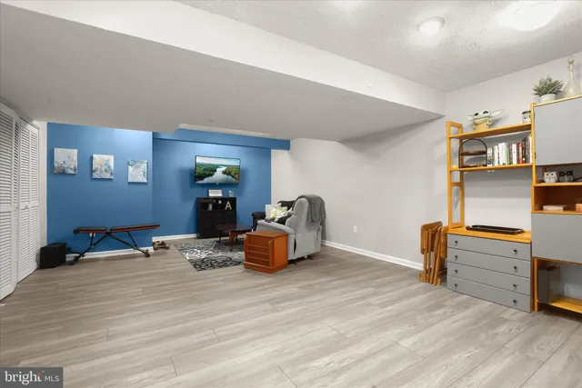 a bedroom with furniture and a bed